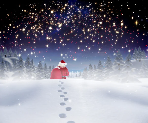 Santa walking in the snow — Stock Photo, Image