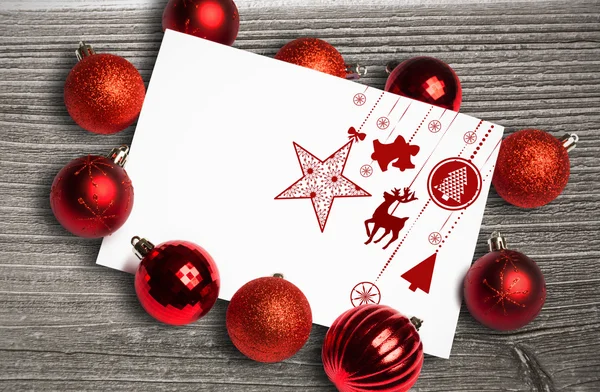 Composite image of hanging red christmas decorations — Stock Photo, Image