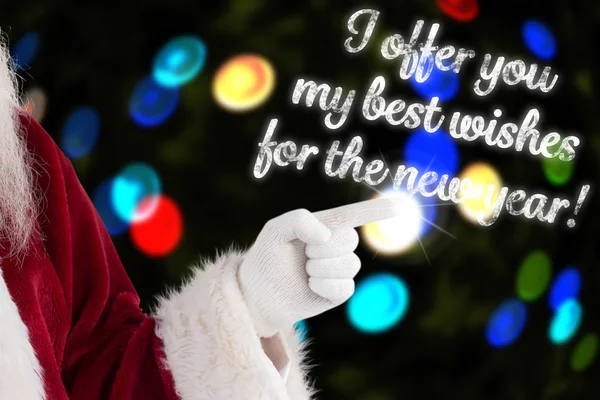 Santa Claus punten op iets — Stockfoto