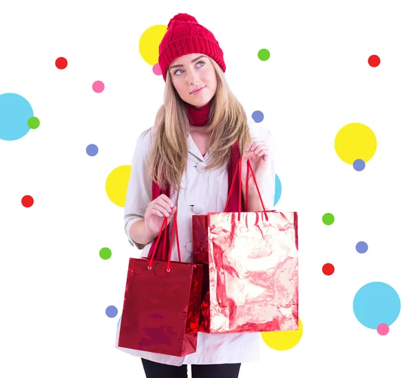 Pretty blonde holding shopping bags — Stock Photo, Image