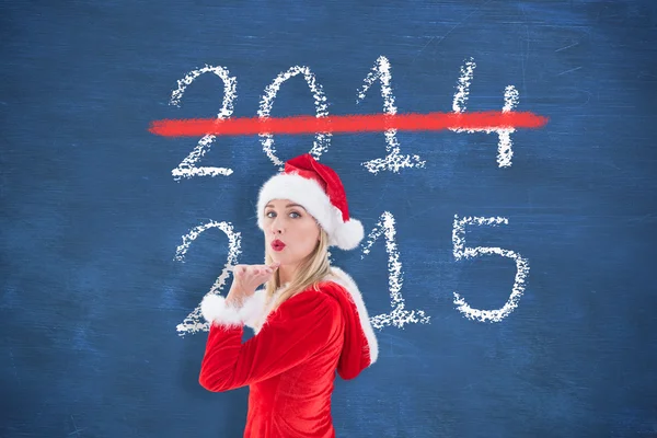 Feestelijke blonde blaast een kus — Stockfoto