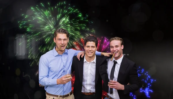 Composite image of handsome friends having a drink together — Stock Photo, Image