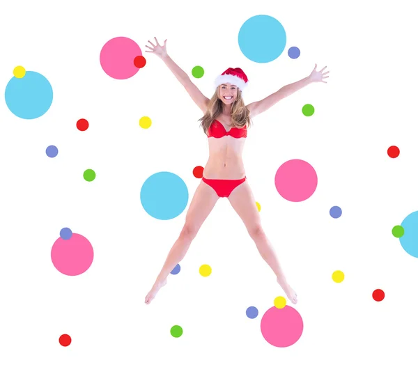 Festive fit blonde in red bikini — Stock Photo, Image