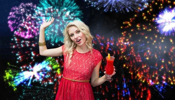 Composite image of blonde drinking cocktail — Stock Photo, Image