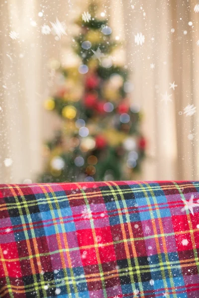 Warm blanket on the couch at christmas — Stock Photo, Image