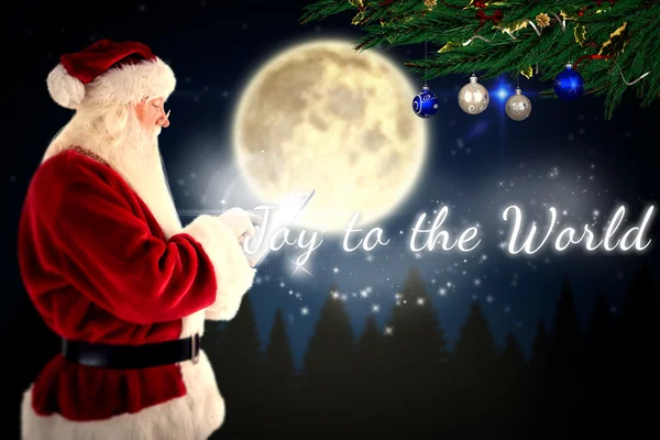 Babbo Natale utilizza un tablet pc — Foto Stock