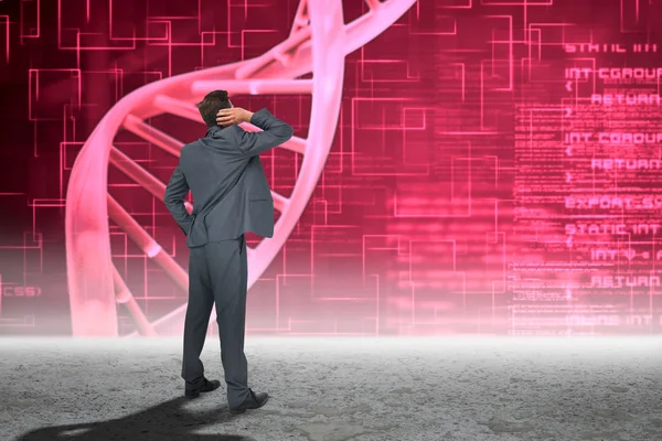 Zakenman tegen roze dna helix — Stockfoto