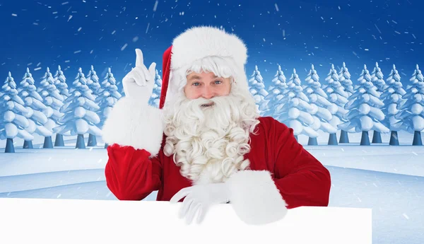 Lächelnder Weihnachtsmann macht eine Geste — Stockfoto
