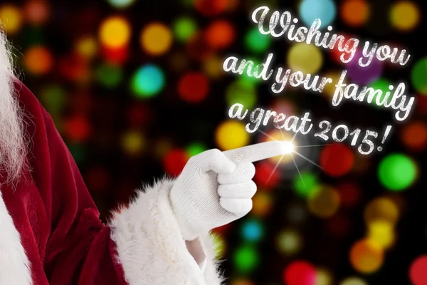 Santa Claus points at something — Stock Photo, Image