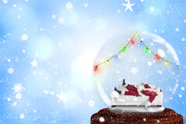 Santa sleeping in snow globe — Stock Photo, Image