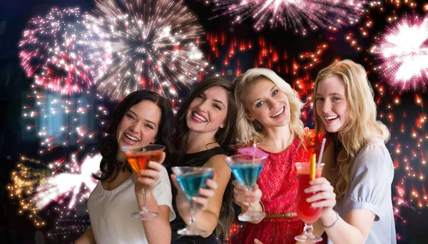 Composite image of friends with drinks — Stock Photo, Image