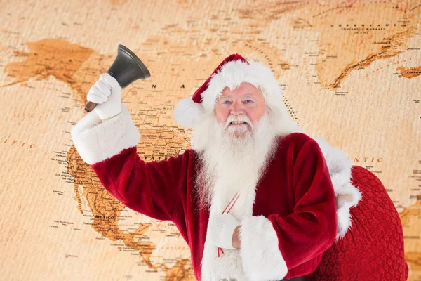 Happy santa ringer en klocka — Stockfoto