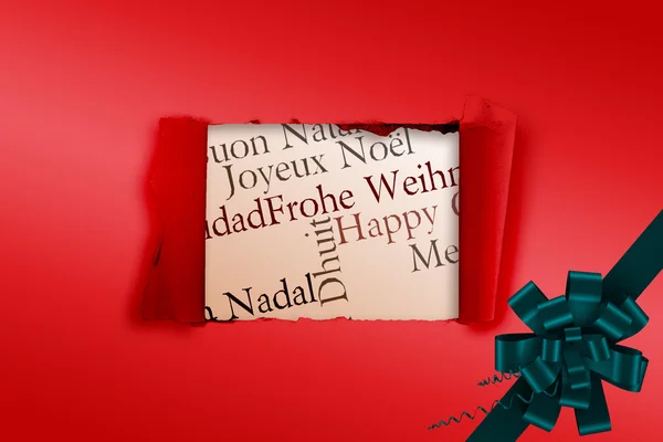 Arco de Navidad y cinta contra rasgadura en papel —  Fotos de Stock