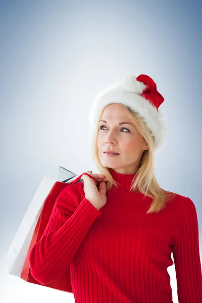 Feliz rubia festiva con bolsa de compras — Foto de Stock