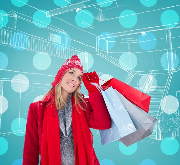 Rubia celebración bolsas de compras —  Fotos de Stock