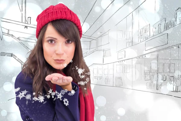 Festive brunette blowing a kiss — Stock Photo, Image