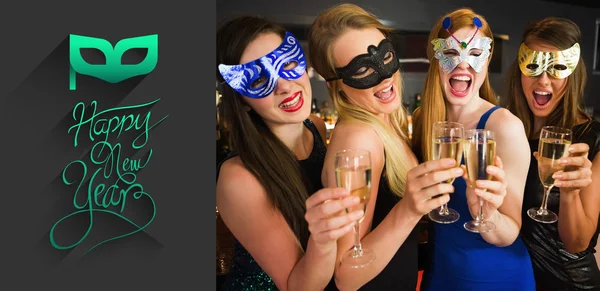 Friends with masks on holding champagne — Stock Photo, Image