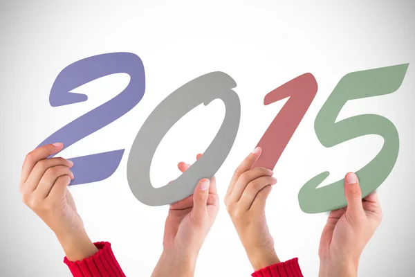 Composite image of hands holding poster — Stock Photo, Image