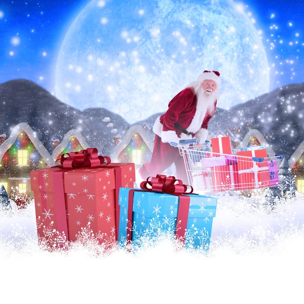 Weihnachtsmann fährt auf Einkaufswagen — Stockfoto