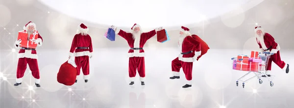 Zusammengesetztes Bild verschiedener Weihnachtsmänner — Stockfoto