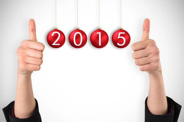 Businesswomans hands showing thumbs up — Stock Photo, Image