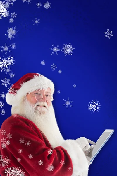 Santa používá počítače tablet Pc — Stock fotografie