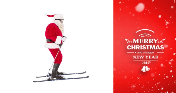 Festive father christmas skiing — Stock Photo, Image