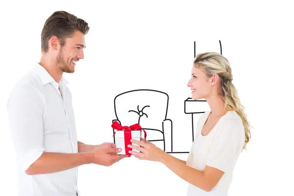 Young couple with gift — Stock Photo, Image