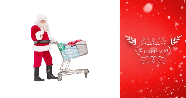 Weihnachtsmann bringt Geschenke mit Einkaufswagen — Stockfoto
