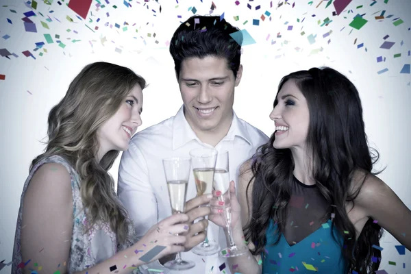 Composite image of friends drinking champagne — Stock Photo, Image