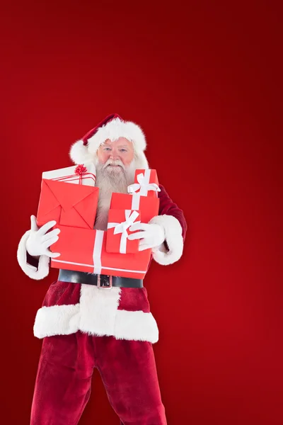 Babbo Natale porta alcuni regali — Foto Stock