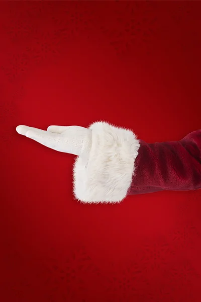 Санта Клаус показывает открытую руку — стоковое фото