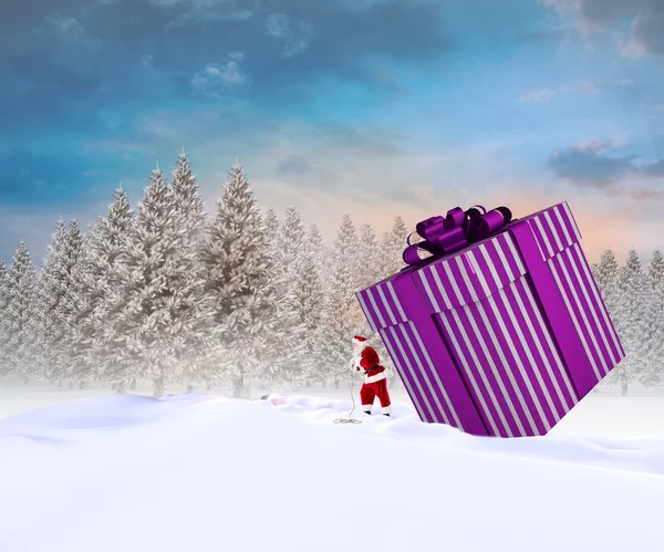 Santa leverera stora gåva — Stockfoto