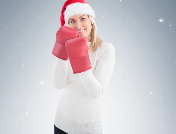 Festive blonde in boxing gloves — Stock Photo, Image