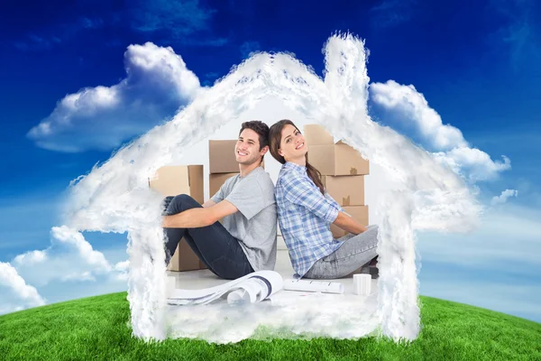 Couple sitting back-to-back — Stock Photo, Image