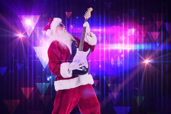 Santa tocando la guitarra eléctrica — Foto de Stock