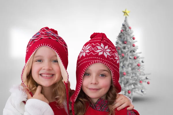 Composite image of cute girls in hats — Stock Photo, Image