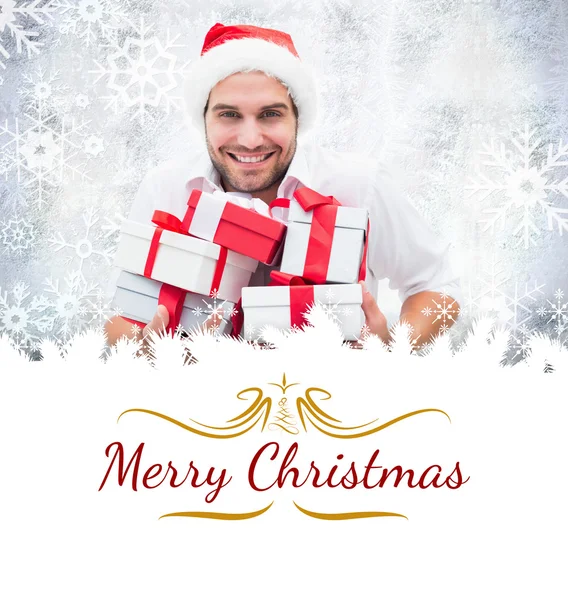 Festlicher Mann mit Weihnachtsgeschenken — Stockfoto
