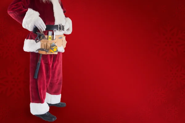 Papai Noel empurra um carrinho de compras — Fotografia de Stock