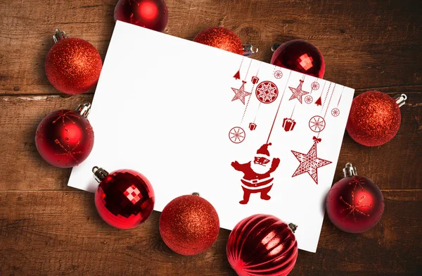 Imagen compuesta de colgar adornos rojos de Navidad —  Fotos de Stock