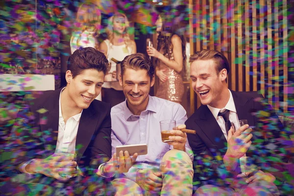 Handsome friends having a drink together — Stock Photo, Image