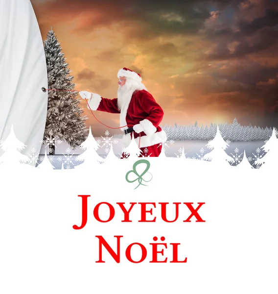 Image composite du Père Noël tire quelque chose — Photo