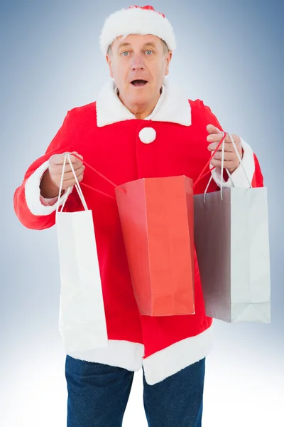 Torby na zakupy świąteczne człowiek gospodarstwa — Zdjęcie stockowe