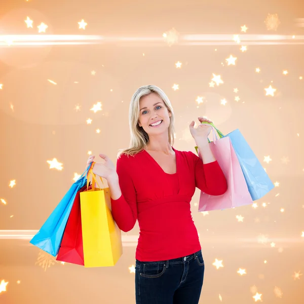 Blonde bedrijf shopping tassen — Stockfoto