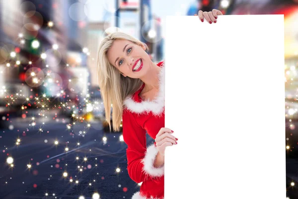 Festive blonde showing white card — Stock Photo, Image