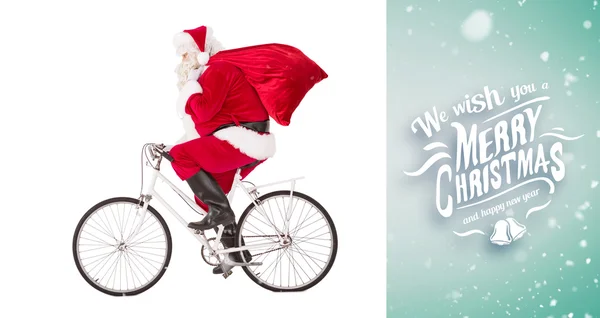 Papai Noel entrega presentes com bicicleta — Fotografia de Stock