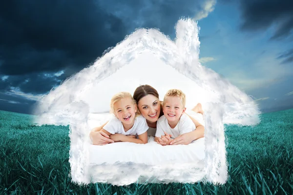 Laughing children playing with their mother — Stock Photo, Image