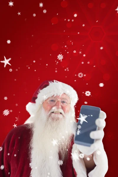 Weihnachtsmann zeigt Smartphone — Stockfoto