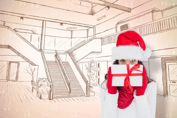 Brunette in red gloves and santa hat showing — Stock Photo, Image