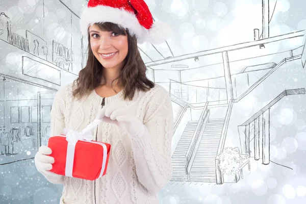 Žena v santa hat otevření dar — Stock fotografie